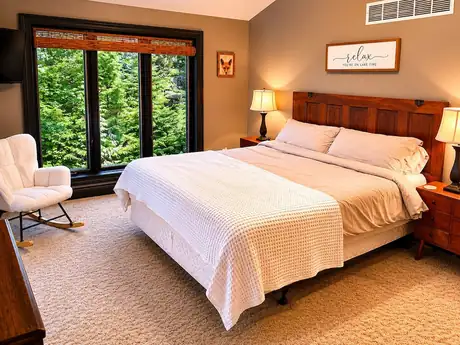 Bedroom one with a king bed