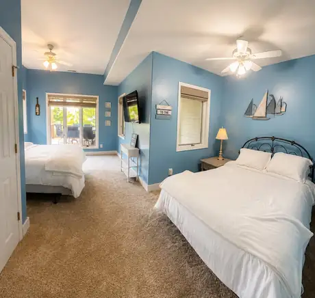 Bedroom four with two queen beds
