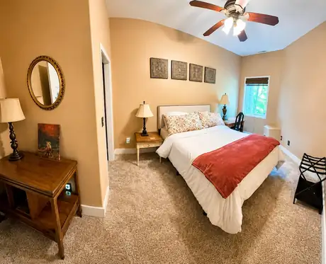 Bedroom five with a queen bed