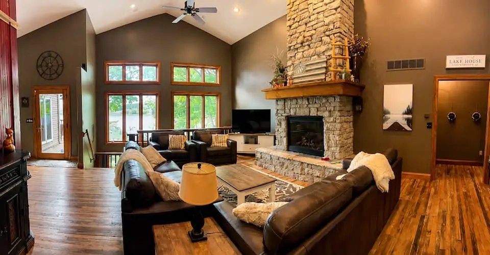 Living room with stone fireplace